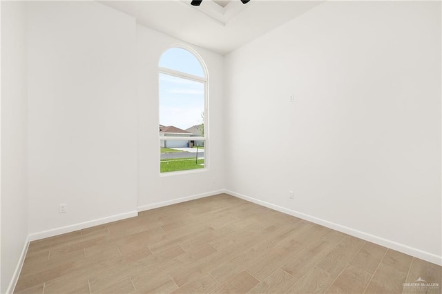 820 N Trinity St, Edinburg, TX 78541 - spare room with light wood-style floors, plenty of natural light, and ceiling fan