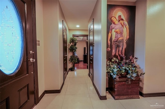 entrance foyer with light tile patterned floors