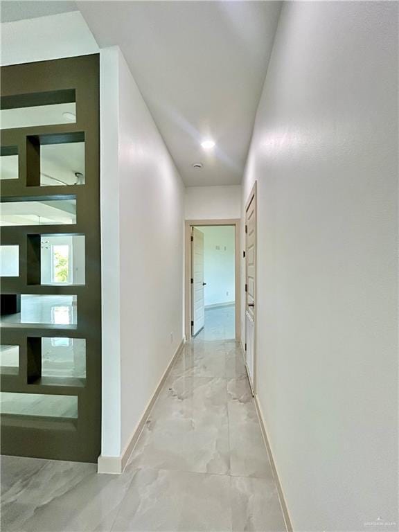 514 Oriole Dr, Los Fresnos, TX 78566 - corridor featuring baseboards and marble finish flooring