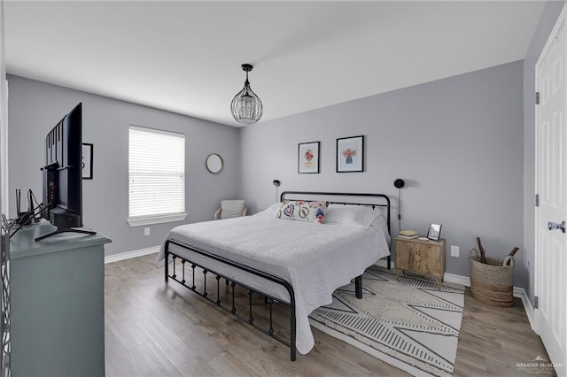 408 Bernal St, Edinburg, TX 78539 - bedroom with wood finished floors and baseboards