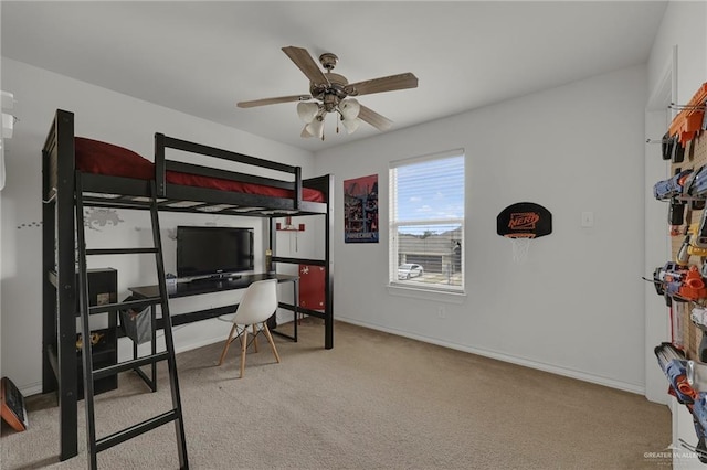 408 Bernal St, Edinburg, TX 78539 - carpeted bedroom with a desk, baseboards, and a ceiling fan