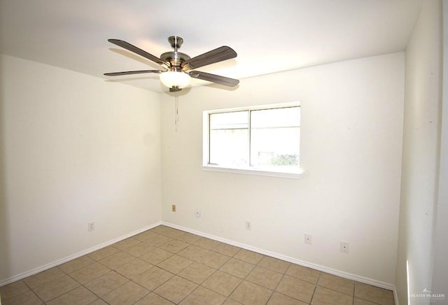 spare room with ceiling fan