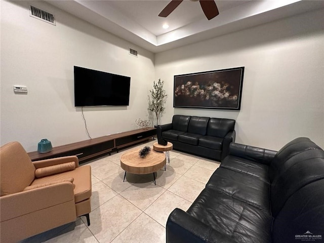 living room with visible vents, light tile patterned floors, a ceiling fan, and recessed lighting