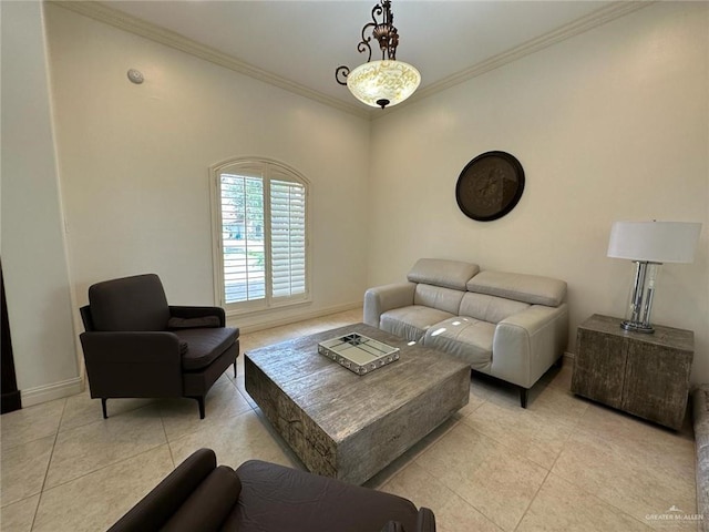 living room with light tile patterned floors, crown molding, and baseboards