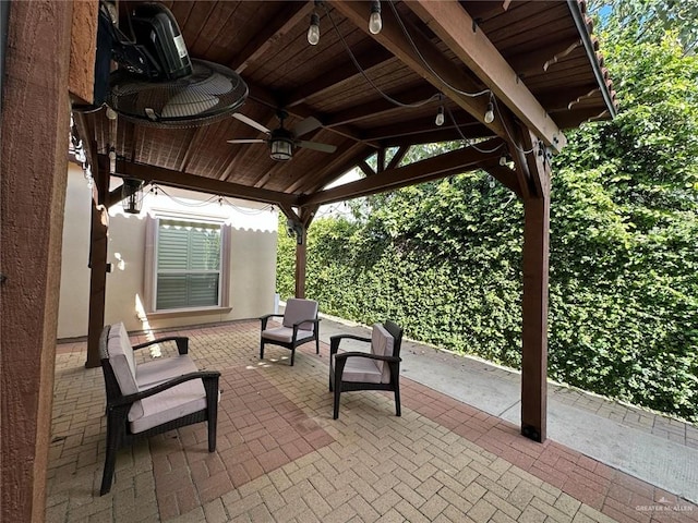 view of patio / terrace featuring a ceiling fan
