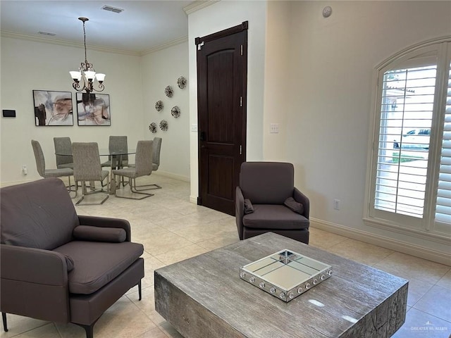 living area featuring an inviting chandelier, light tile patterned floors, crown molding, visible vents, and baseboards