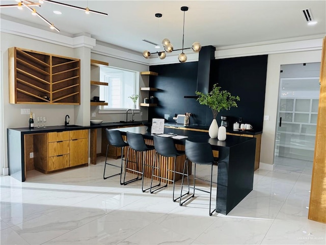 kitchen featuring dark countertops, marble finish floor, visible vents, and open shelves