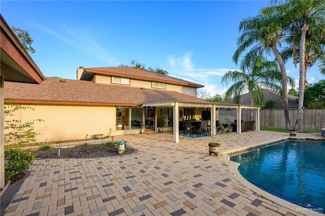 2405 E Lazy Lake Dr, Harlingen, TX 78550 - view of swimming pool with a fenced backyard and a patio