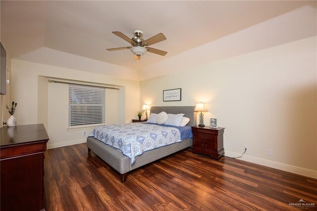 2405 E Lazy Lake Dr, Harlingen, TX 78550 - bedroom featuring baseboards, dark wood-type flooring, a raised ceiling, and ceiling fan