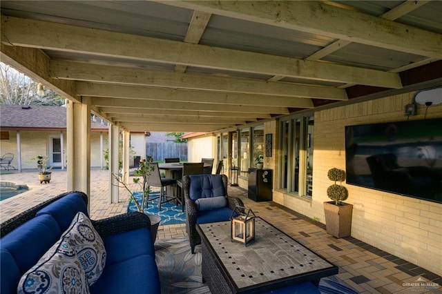 2405 E Lazy Lake Dr, Harlingen, TX 78550 - view of patio featuring an outdoor hangout area and outdoor dining area