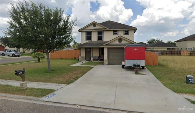 front facade featuring a garage and a front yard