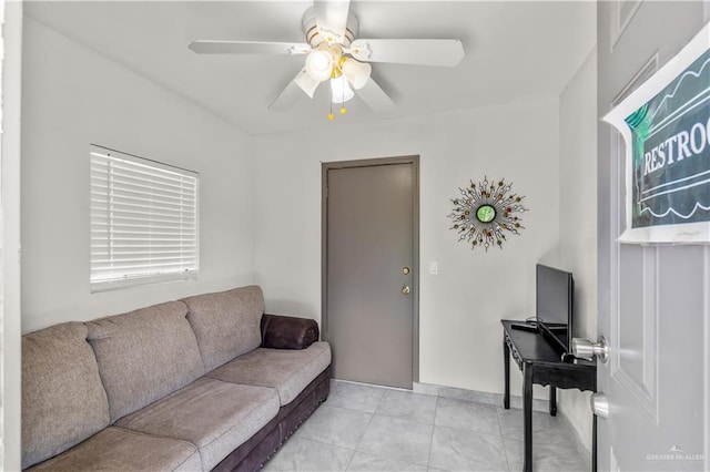18064 Garrett Rd, Harlingen, TX 78552 - living room featuring ceiling fan and light tile patterned floors