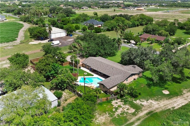 18064 Garrett Rd, Harlingen, TX 78552 - view of property location with a pool and a tree filled landscape