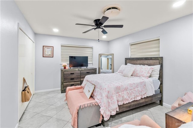 18064 Garrett Rd, Harlingen, TX 78552 - bedroom featuring light tile patterned flooring, recessed lighting, and a ceiling fan