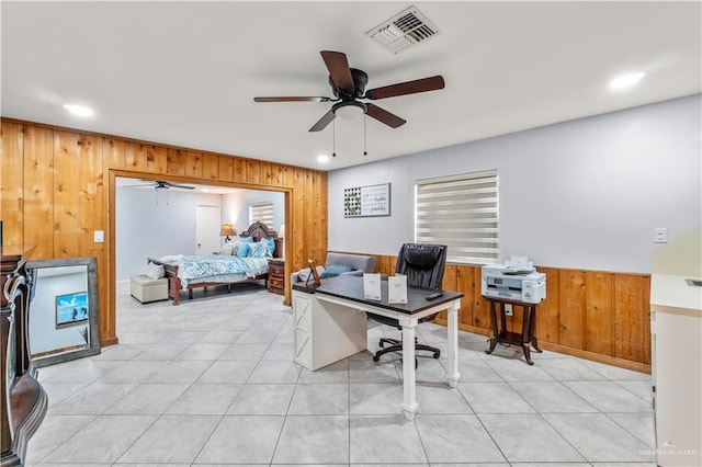 18064 Garrett Rd, Harlingen, TX 78552 - office with wood walls, ceiling fan, recessed lighting, a wainscoted wall, and light tile patterned floors