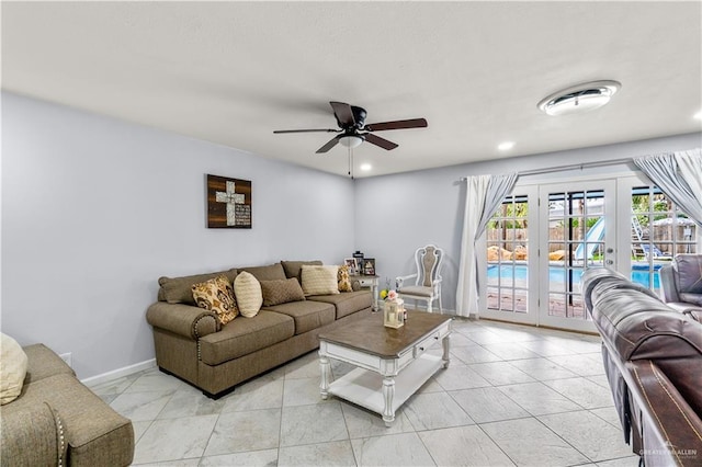 18064 Garrett Rd, Harlingen, TX 78552 - living room featuring french doors, ceiling fan, light tile patterned floors, and recessed lighting