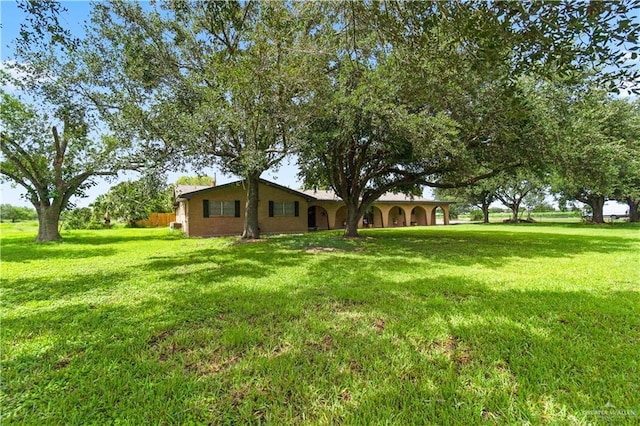18064 Garrett Rd, Harlingen, TX 78552 - view of grassy yard