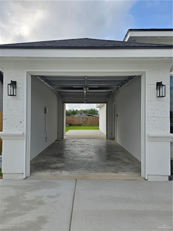 garage with a carport