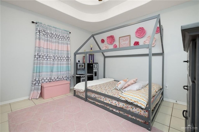 bedroom featuring tile patterned flooring