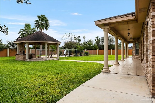 view of yard with a gazebo and a patio