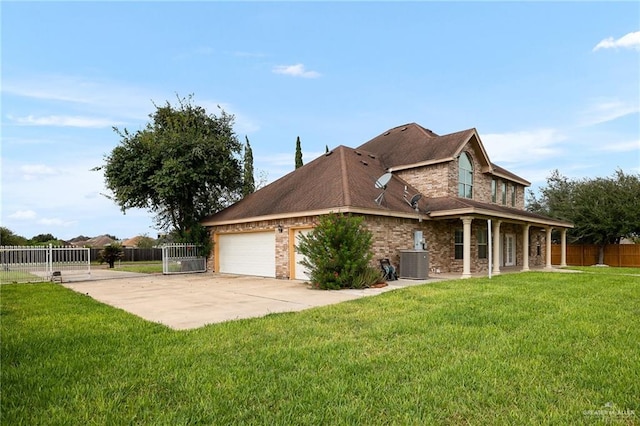 view of property exterior featuring a garage, central AC unit, and a lawn