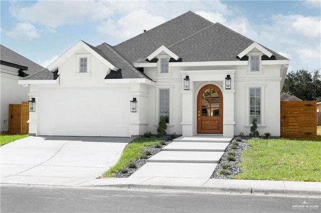 view of front of home with a front lawn