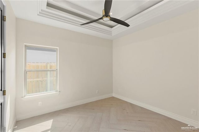 empty room featuring ceiling fan and light parquet flooring