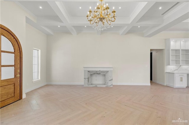 unfurnished living room with beam ceiling, crown molding, light parquet floors, and an inviting chandelier