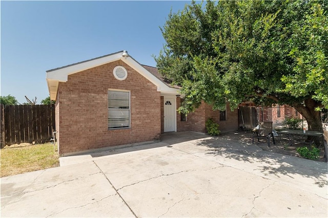 view of front of home featuring a patio area