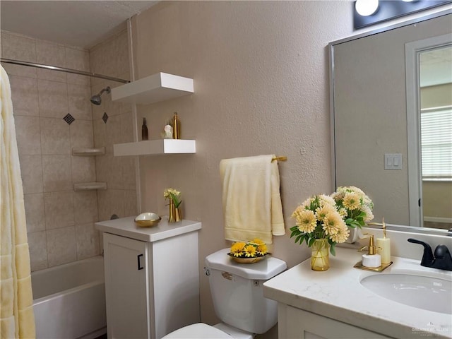 full bathroom with shower / bath combo, vanity, and toilet