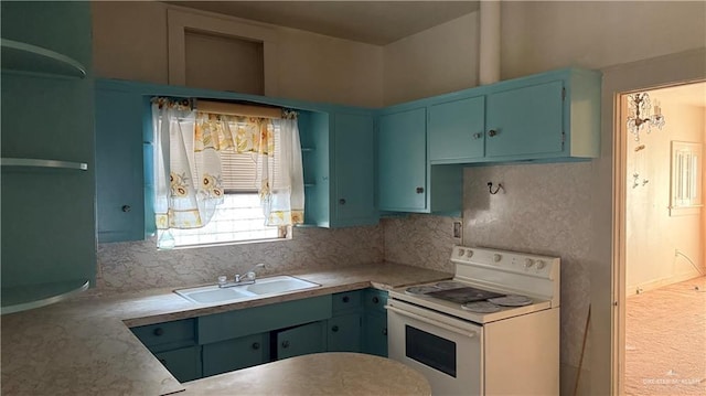 kitchen with a sink, electric range, decorative backsplash, and light countertops