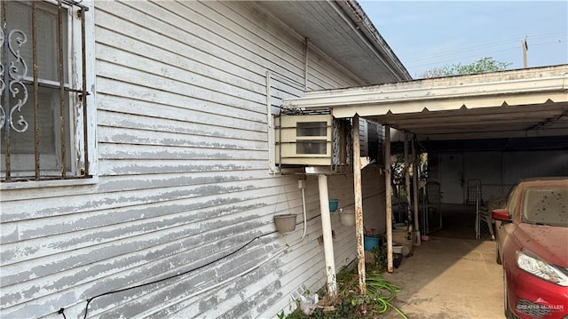 view of property exterior featuring a carport