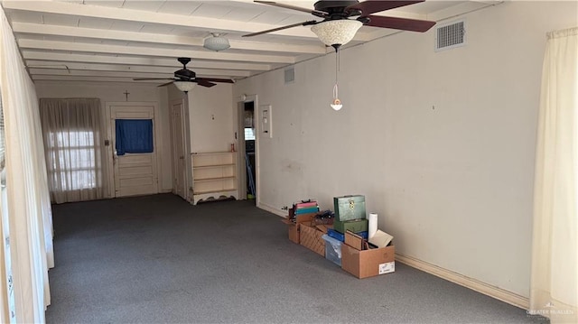 garage featuring visible vents and a ceiling fan