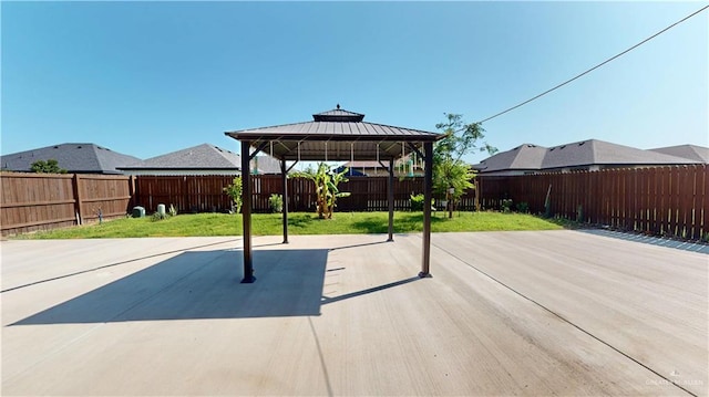 view of patio / terrace featuring a gazebo and a fenced backyard