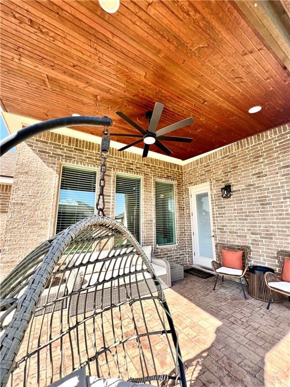 view of patio with ceiling fan