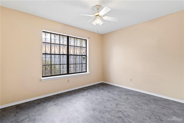 2117 S 30 1/2 St, Mcallen, TX 78503 - empty room with a textured ceiling, ceiling fan, and baseboards