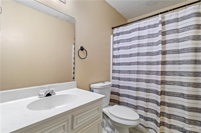 2117 S 30 1/2 St, Mcallen, TX 78503 - full bathroom with toilet, a textured ceiling, vanity, a textured wall, and a shower with curtain