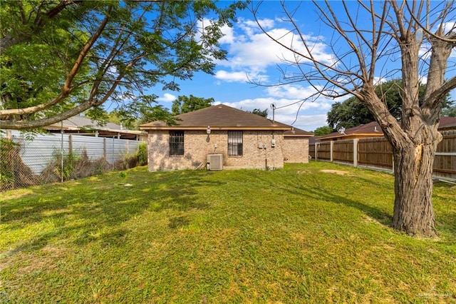 2117 S 30 1/2 St, Mcallen, TX 78503 - back of house with central AC and brick siding