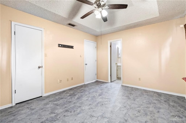 2117 S 30 1/2 St, Mcallen, TX 78503 - unfurnished bedroom with baseboards, ensuite bathroom, and a ceiling fan