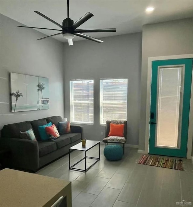 living room featuring ceiling fan