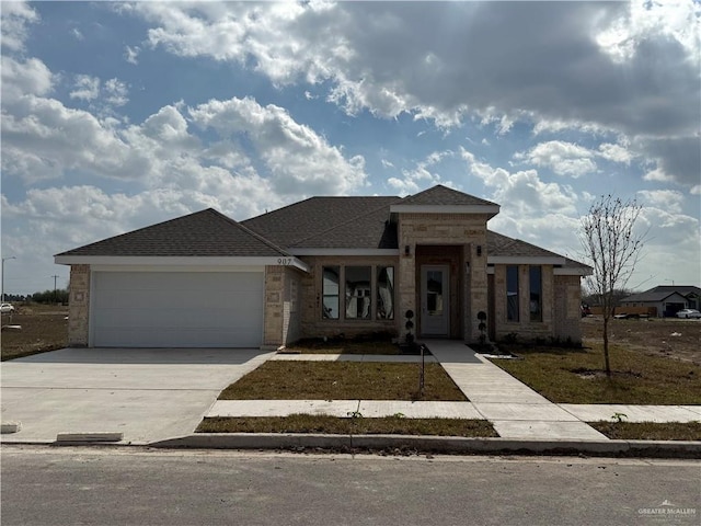 prairie-style home with a garage