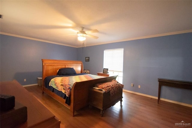 bedroom featuring dark hardwood / wood-style floors, ceiling fan, and ornamental molding