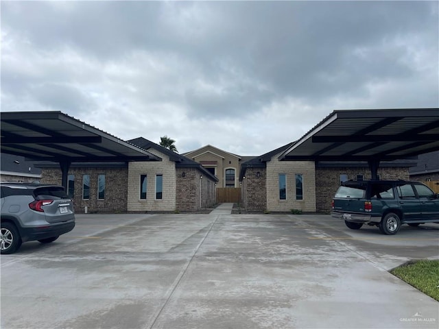 view of front of property with a carport