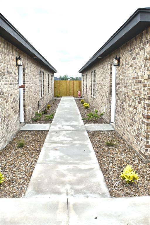 2612 E Israel Ave, Alton, TX 78573 - view of side of property featuring brick siding