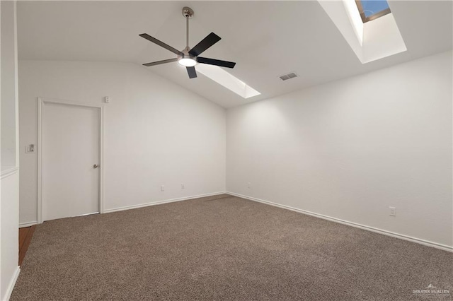 2702 Lazy Lake Dr, Harlingen, TX 78550 - unfurnished room featuring a skylight, lofted ceiling, carpet floors, and a ceiling fan