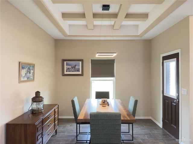 dining area with beam ceiling, a healthy amount of sunlight, and coffered ceiling