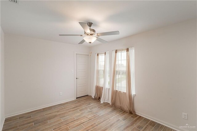 14451 Chalk Ridge Dr, Mcallen, TX 78504 - spare room with light wood-type flooring, baseboards, and a ceiling fan
