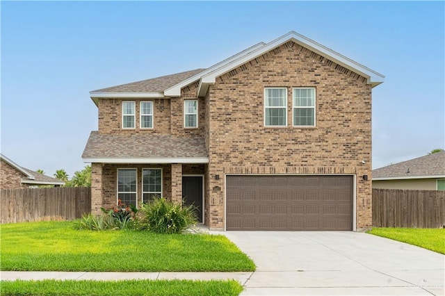 14451 Chalk Ridge Dr, Mcallen, TX 78504 - traditional-style home with an attached garage, brick siding, and driveway