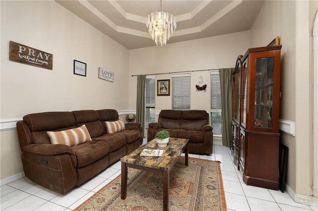 6800 N 35th St, Mcallen, TX 78504 - living room with a tray ceiling, light tile patterned floors, and a notable chandelier