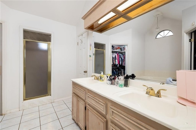 6800 N 35th St, Mcallen, TX 78504 - full bathroom with tile patterned flooring, a sink, lofted ceiling, and a stall shower